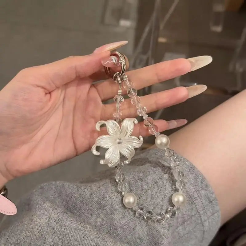 LUXE LINE Lily Flower Beaded Phone Charm Wrist Strap