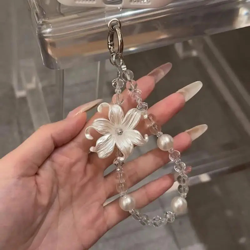 LUXE LINE Lily Flower Beaded Phone Charm Wrist Strap